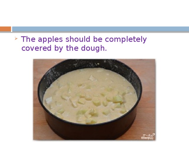 The apples should be completely covered by the dough. 