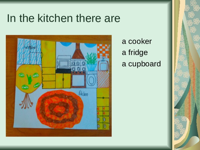 In the kitchen there are a cooker a fridge a cupboard 
