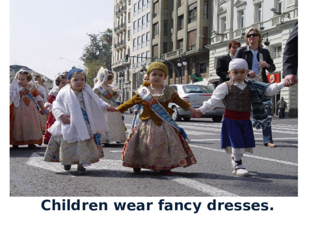 Children wear fancy dresses. 