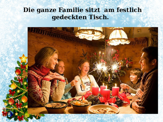  Die ganze Familie sitzt am festlich gedeckten Tisch.   