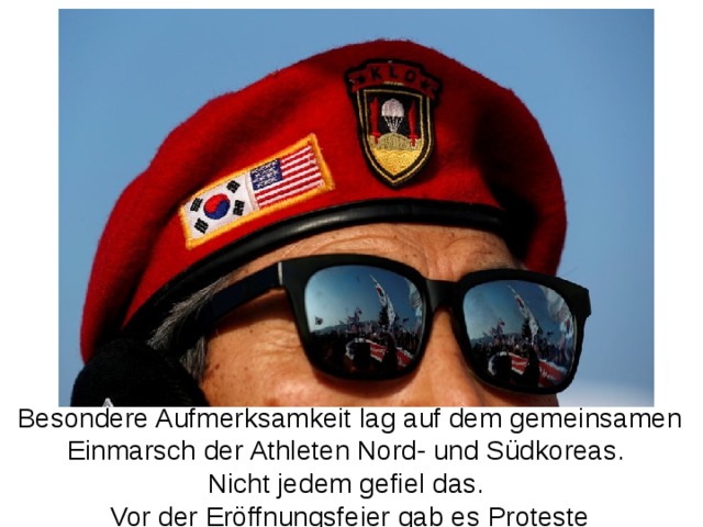 Besondere Aufmerksamkeit lag auf dem gemeinsamen Einmarsch der Athleten Nord- und Südkoreas. Nicht jedem gefiel das. Vor der Eröffnungsfeier gab es Proteste 