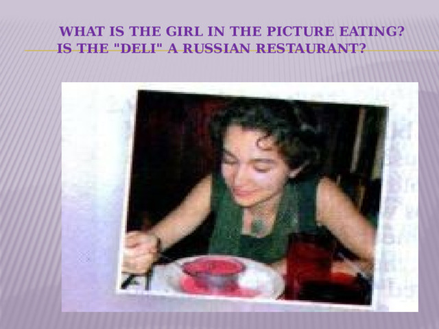    What is the girl in the picture eating?      Is the 